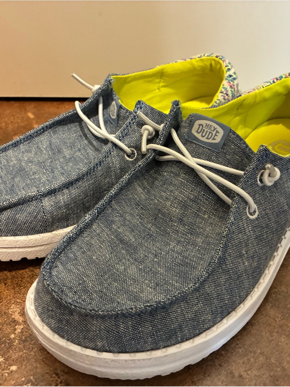 Hey Dude Chambray Slip-On Shoes in Denim Blue with Neon Yellow Lining
